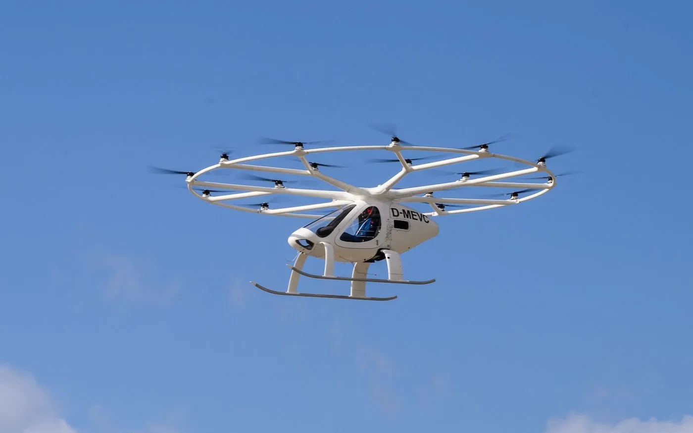 Germany-based company Volocopter 2X's air taxi is flown by test pilot Damian Hischier during a demonstration of South Korea's Urban Air Mobility services at Gimpo International Airport in Seoul in November 11, 2021, in the first ever crewed public test flight of a fully electric vertical take-off and landing (eVTOL) air taxi in South Korea. (Photo by Anthony WALLACE / AFP) (Photo by ANTHONY WALLACE/AFP via Getty Images)