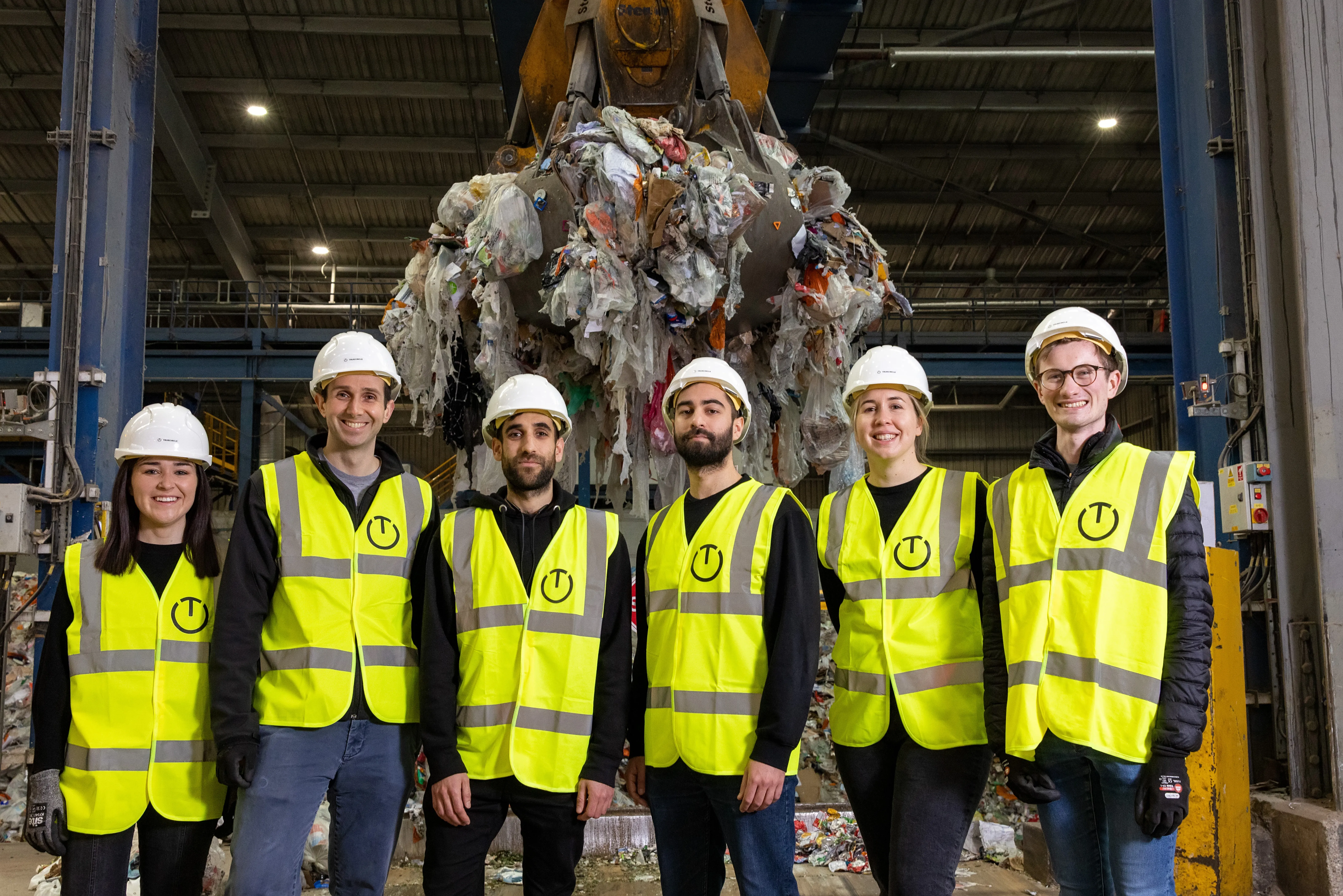 TrueCircle team pictured at a recycling facility