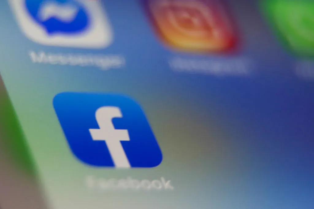 In this photo illustration the Facebook, Messenger, Instagram and WhatsApp icon are seen displayed on smartphone screen
