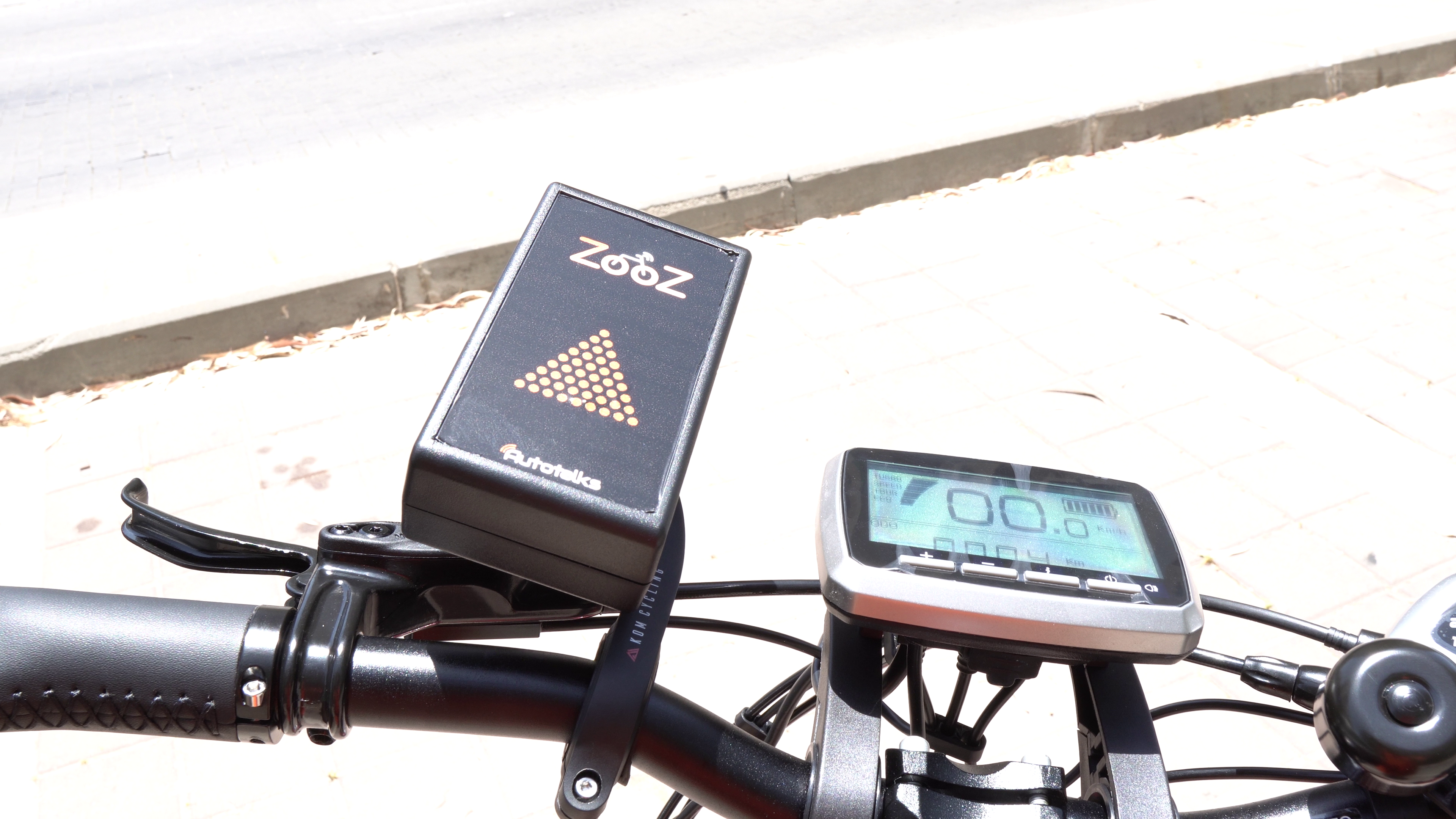 Autotalks ZooZ2 V2X device on handlebars of bike
