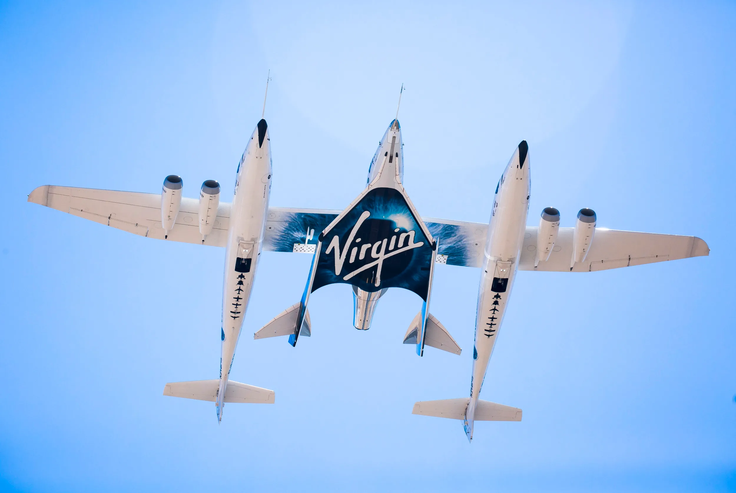 view looking up as Virgin Spaceship Unity and Virgin Mothership Eve take to the skies on it's first captive carry flight