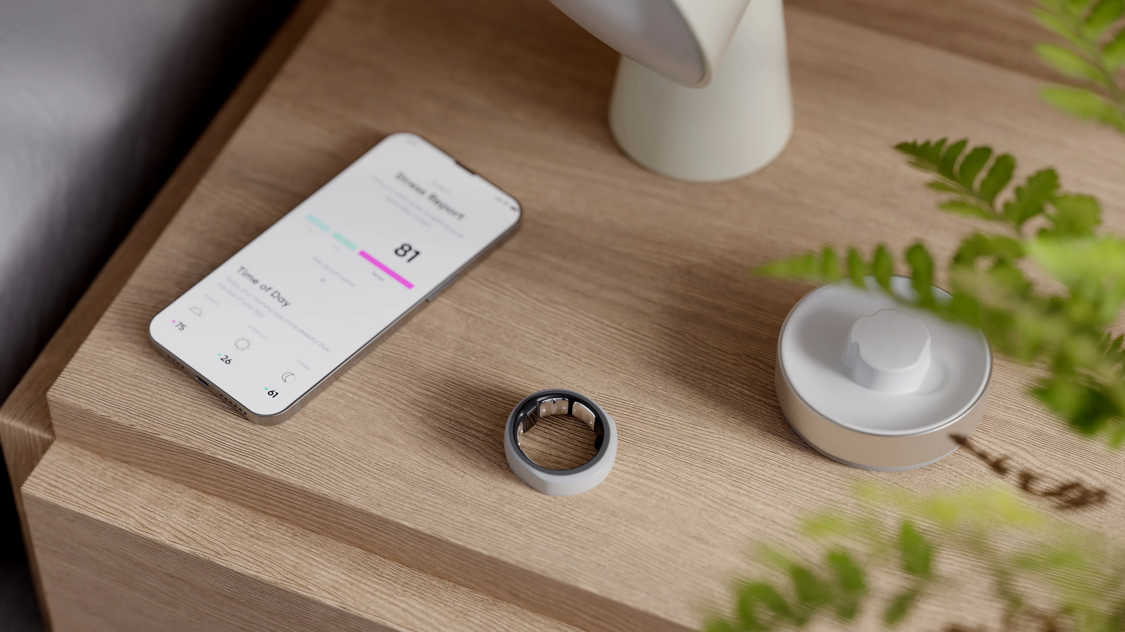ring next to smartphone on nightstand