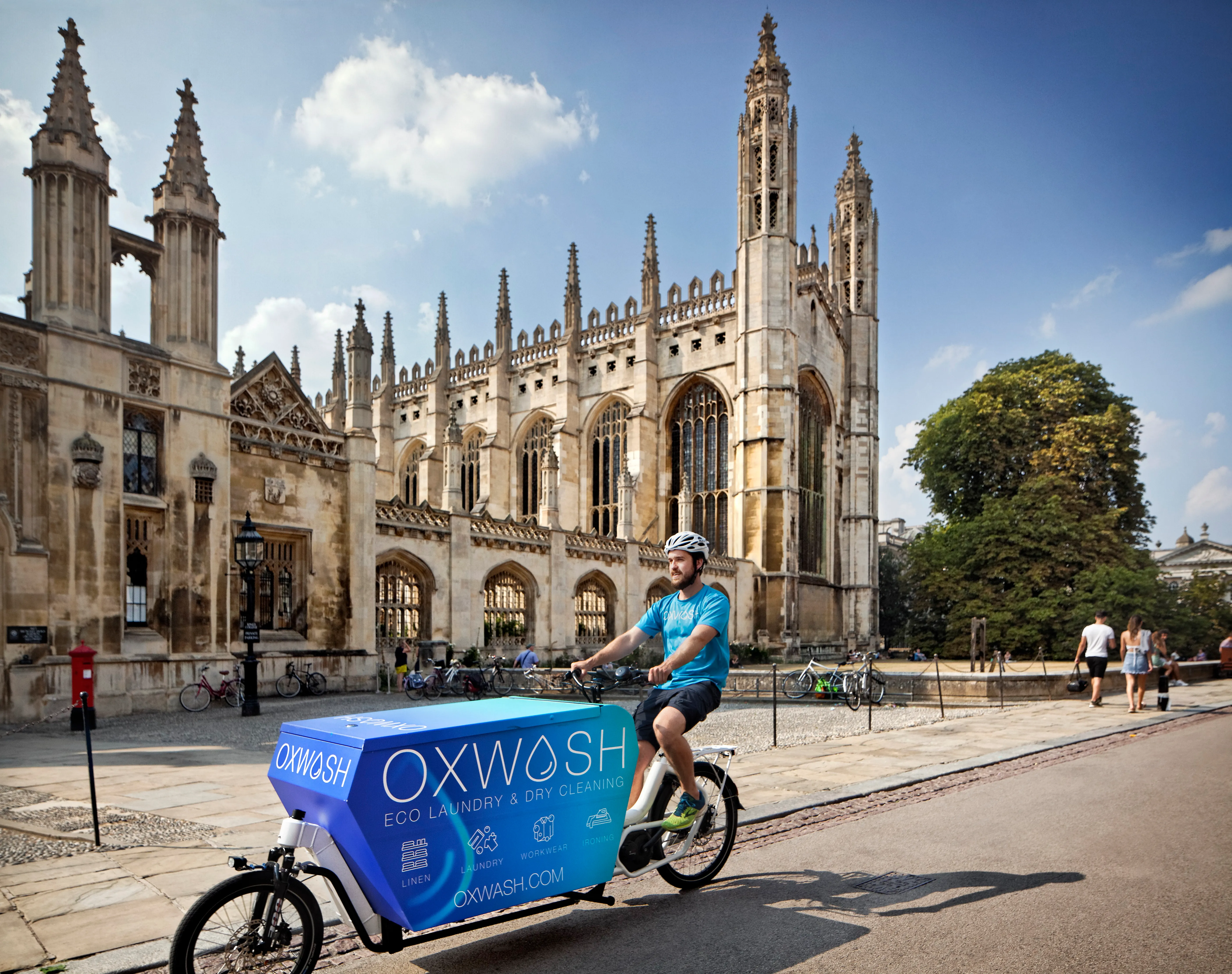 Oxwash e-bike delivery courier on the road in Cambridge