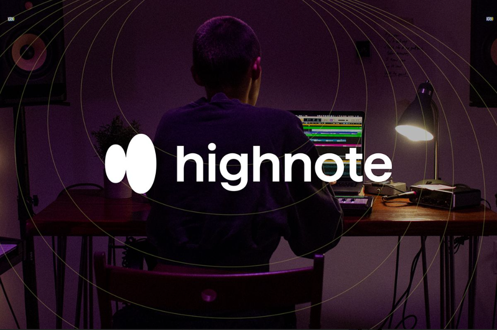 Highnote logo over view from behind of person sitting at laptop