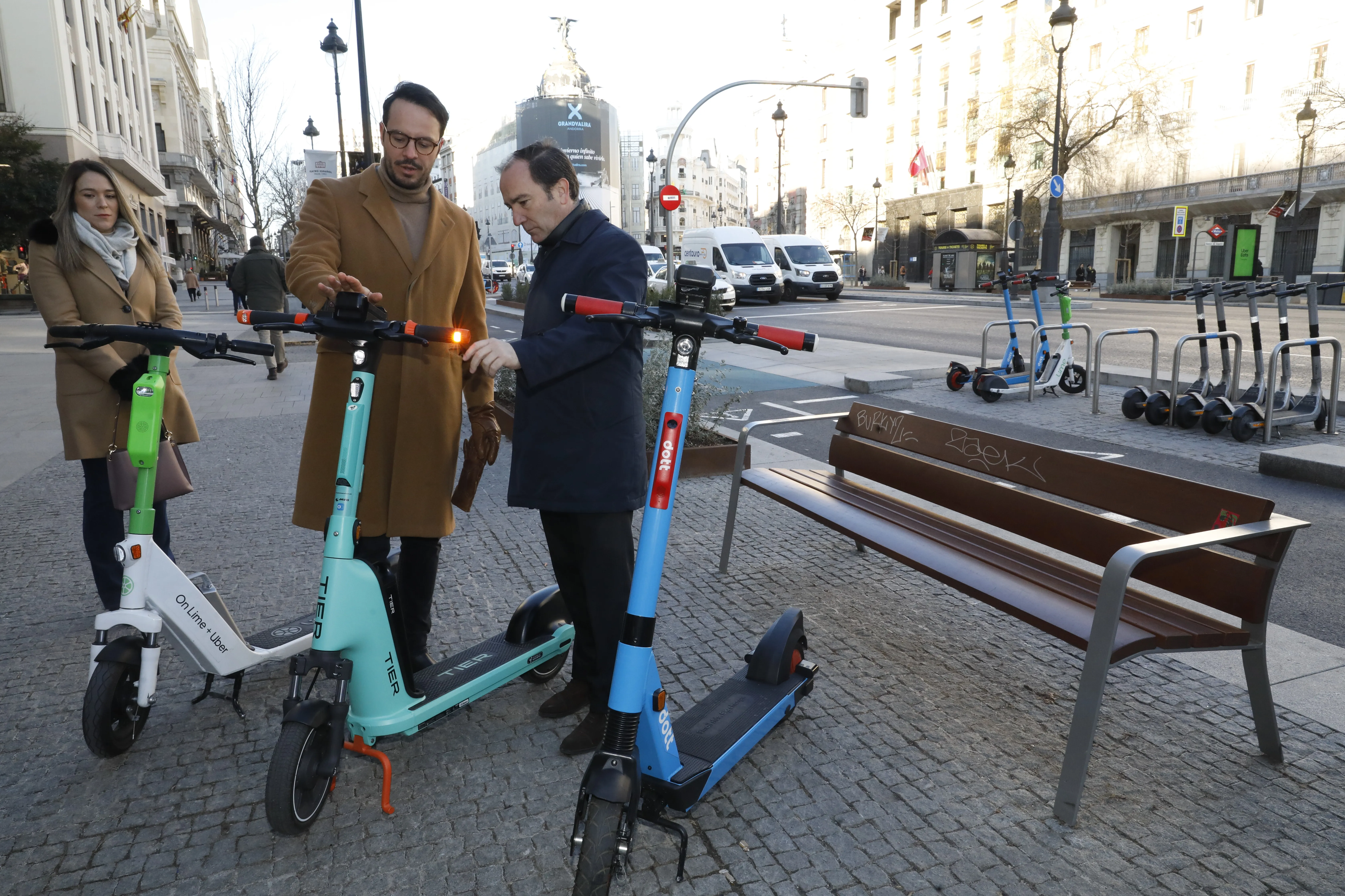 The City Council of Madrid announces the result of the scooter tender in front of three scooters from Dott, Lime and Tier