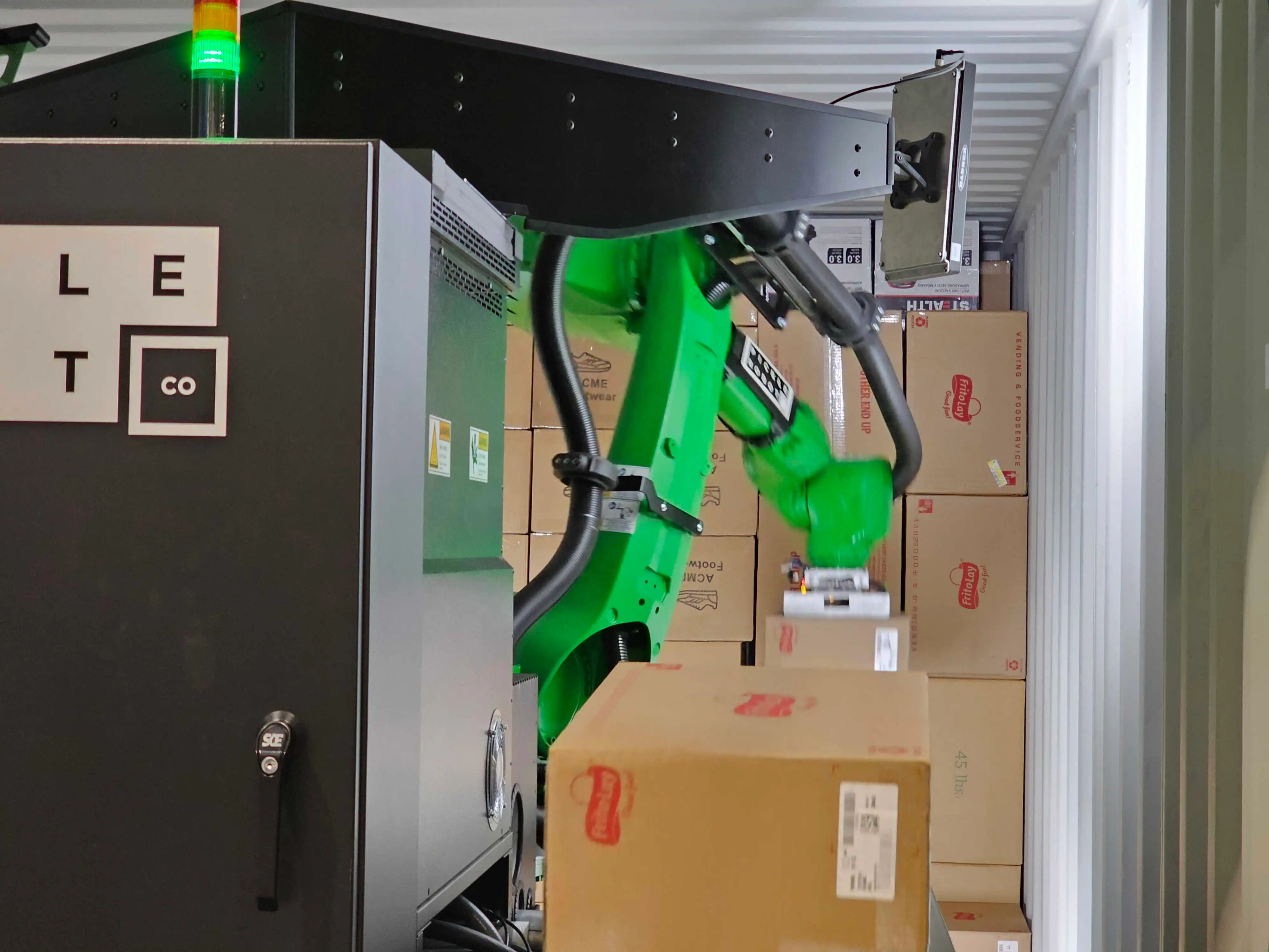 Pickle's truck unloading robot arm