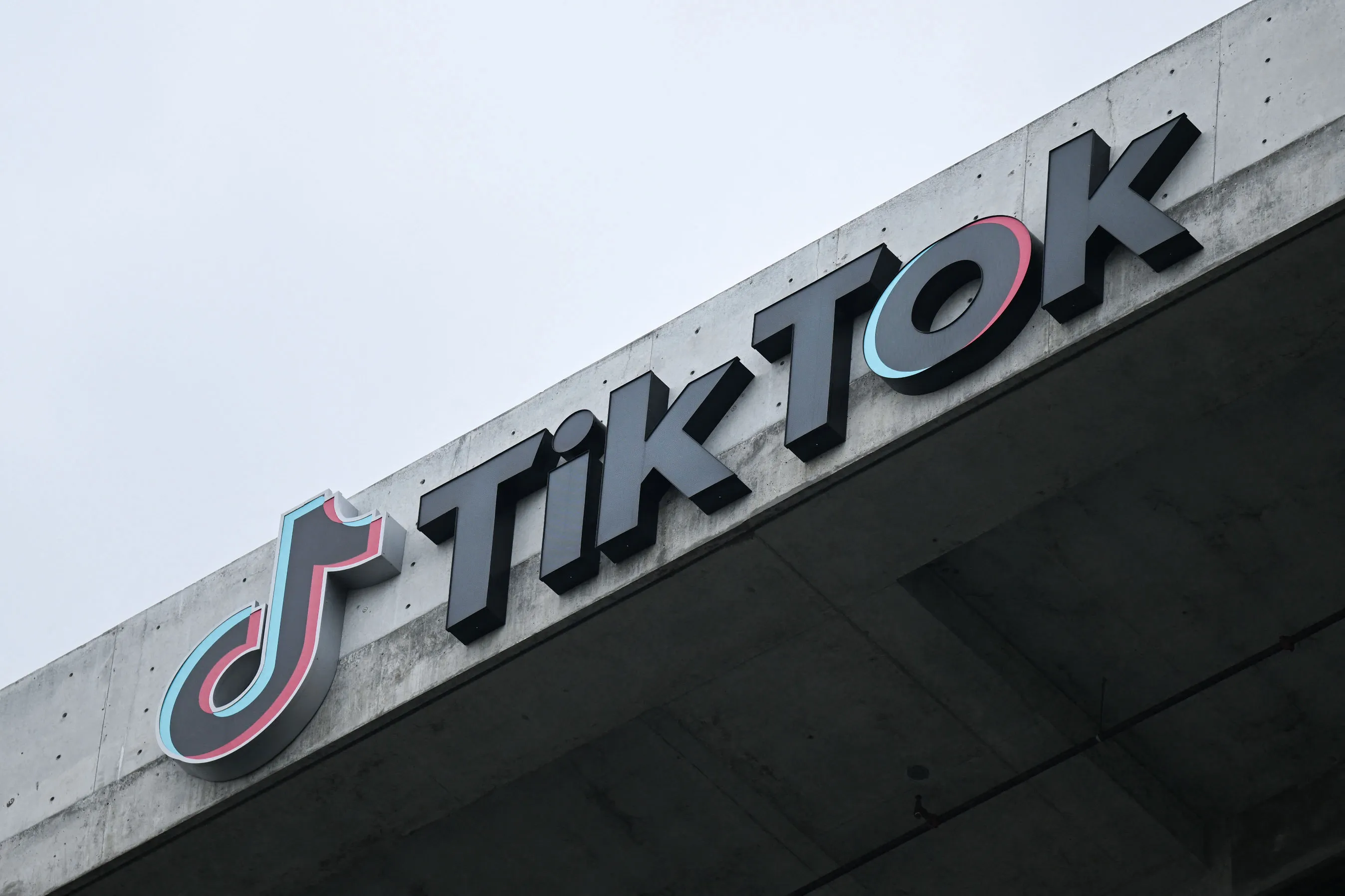 The TikTok logo is displayed on signage outside TikTok social media app company offices in Culver City, California.