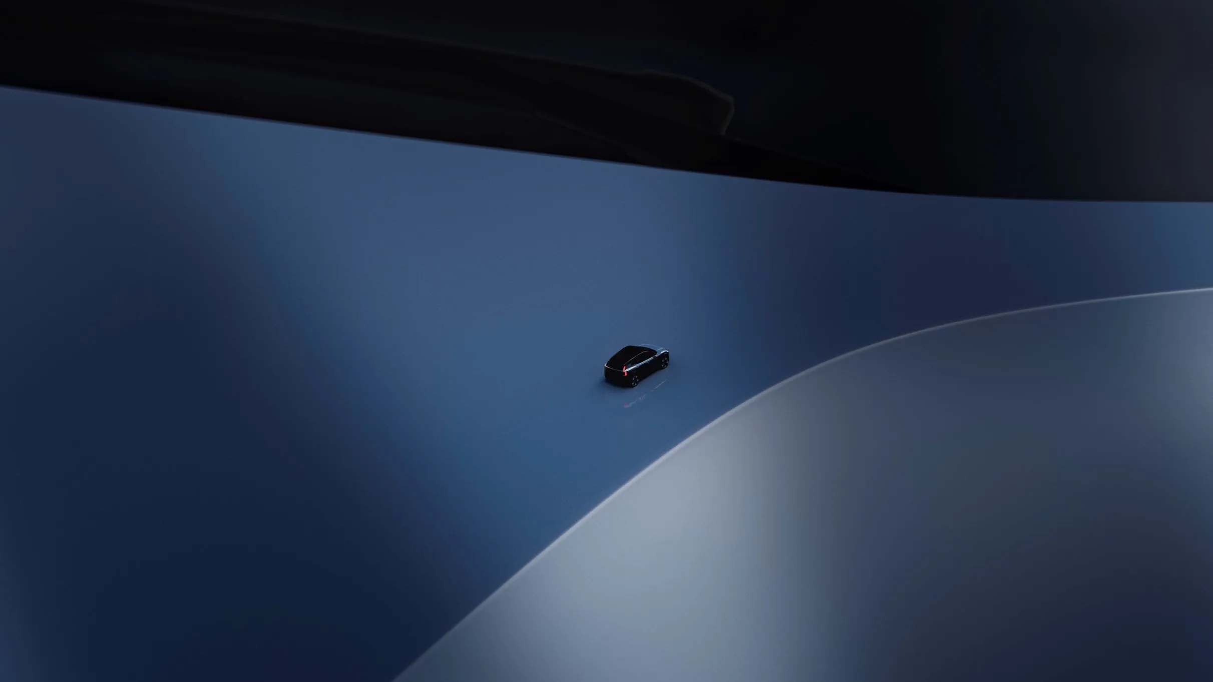 A promotional image for Volvo's upcoming EX30 electric SUV.