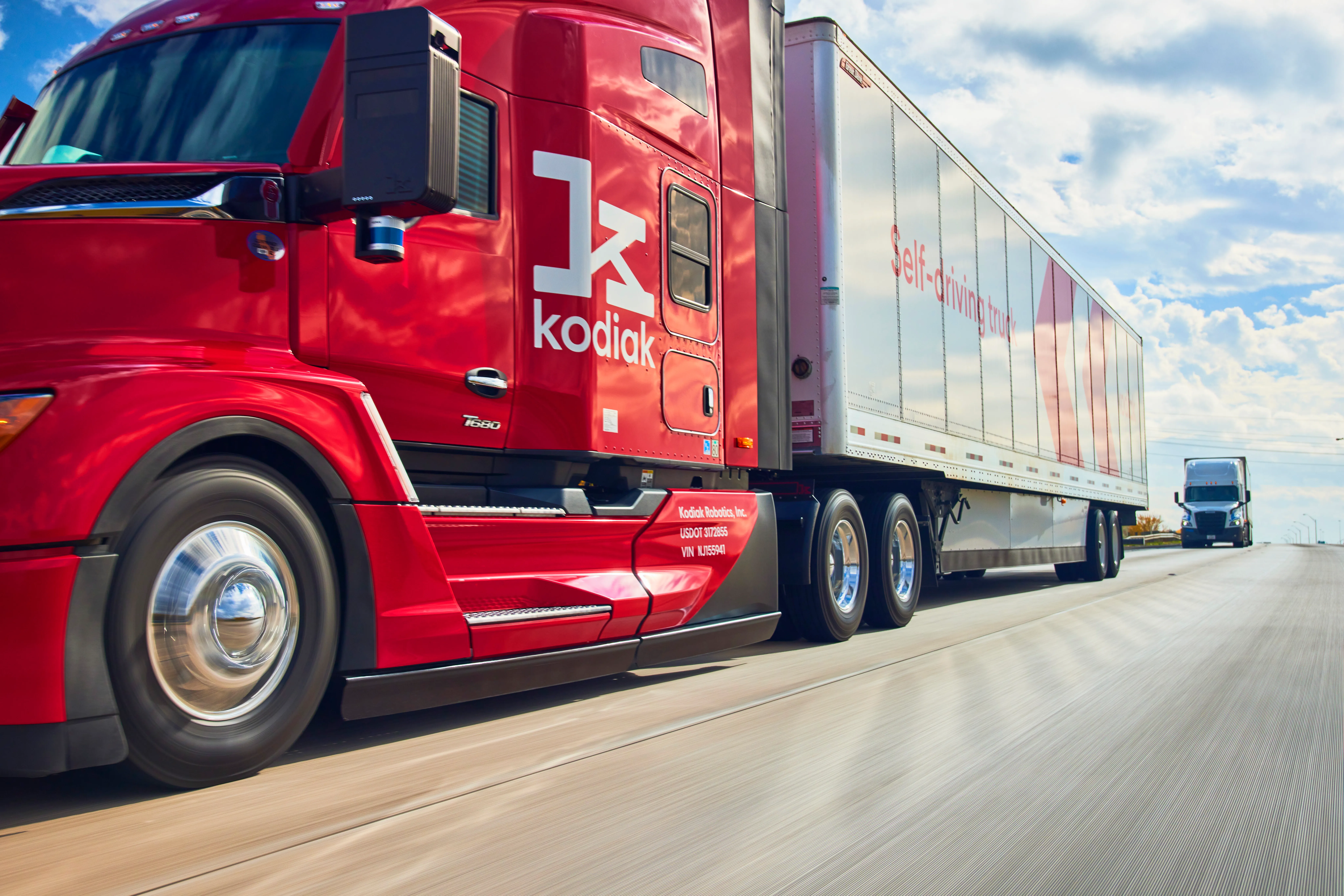 Kodiak Robotics red self-driving truck on highway