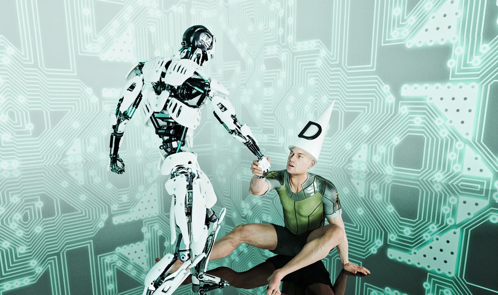 Robot helping up a human being wearing a dunce cap