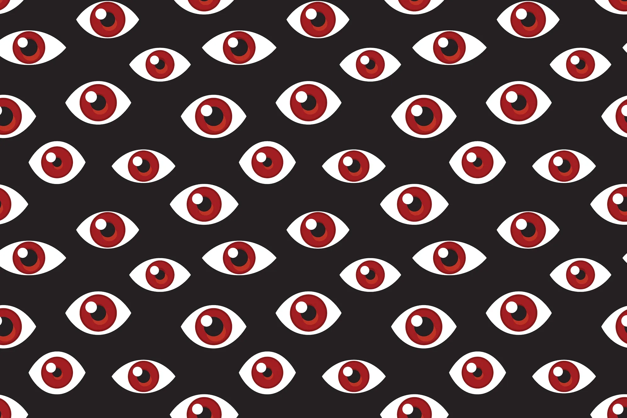 a pattern of red eyes on a darkened background