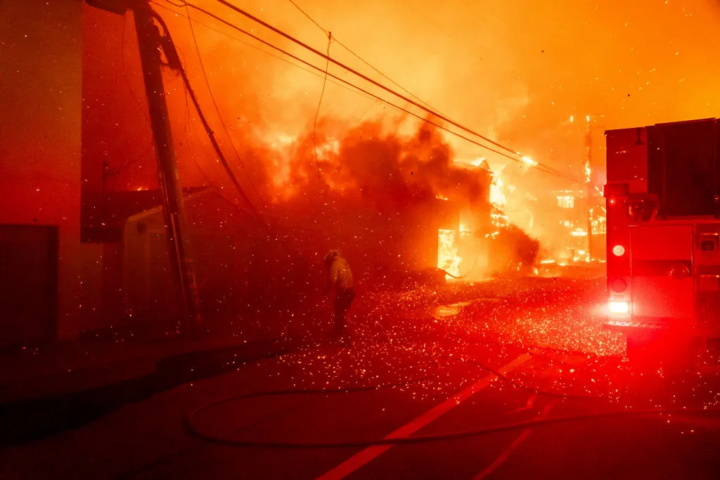 Firefighters battle the Palisades Fire in the Pacific Palisades neighborhood of Los Angeles, California, US, on Tuesday, Jan. 7, 2025.