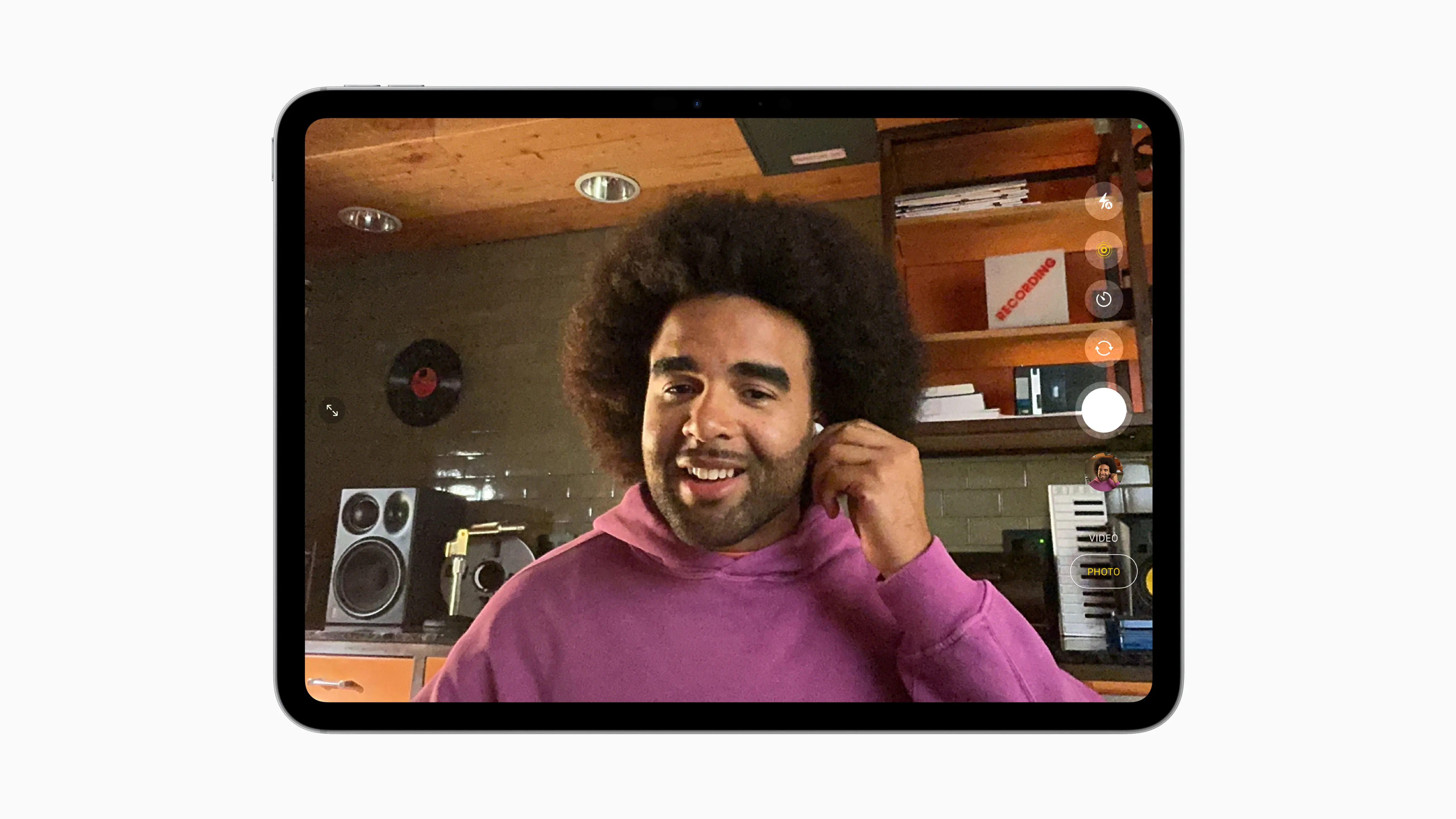 man putting in AirPods