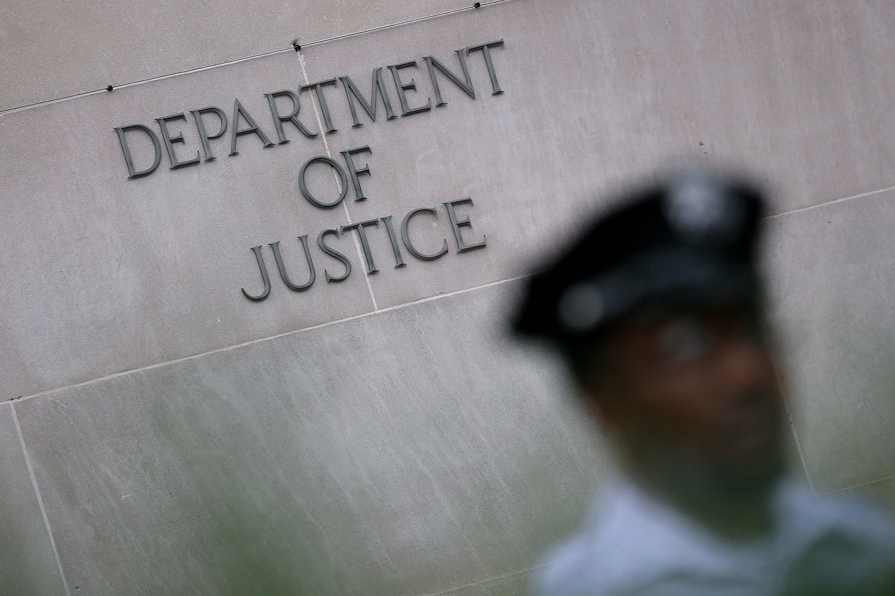 a photo of outside the DOJ in Washington DC