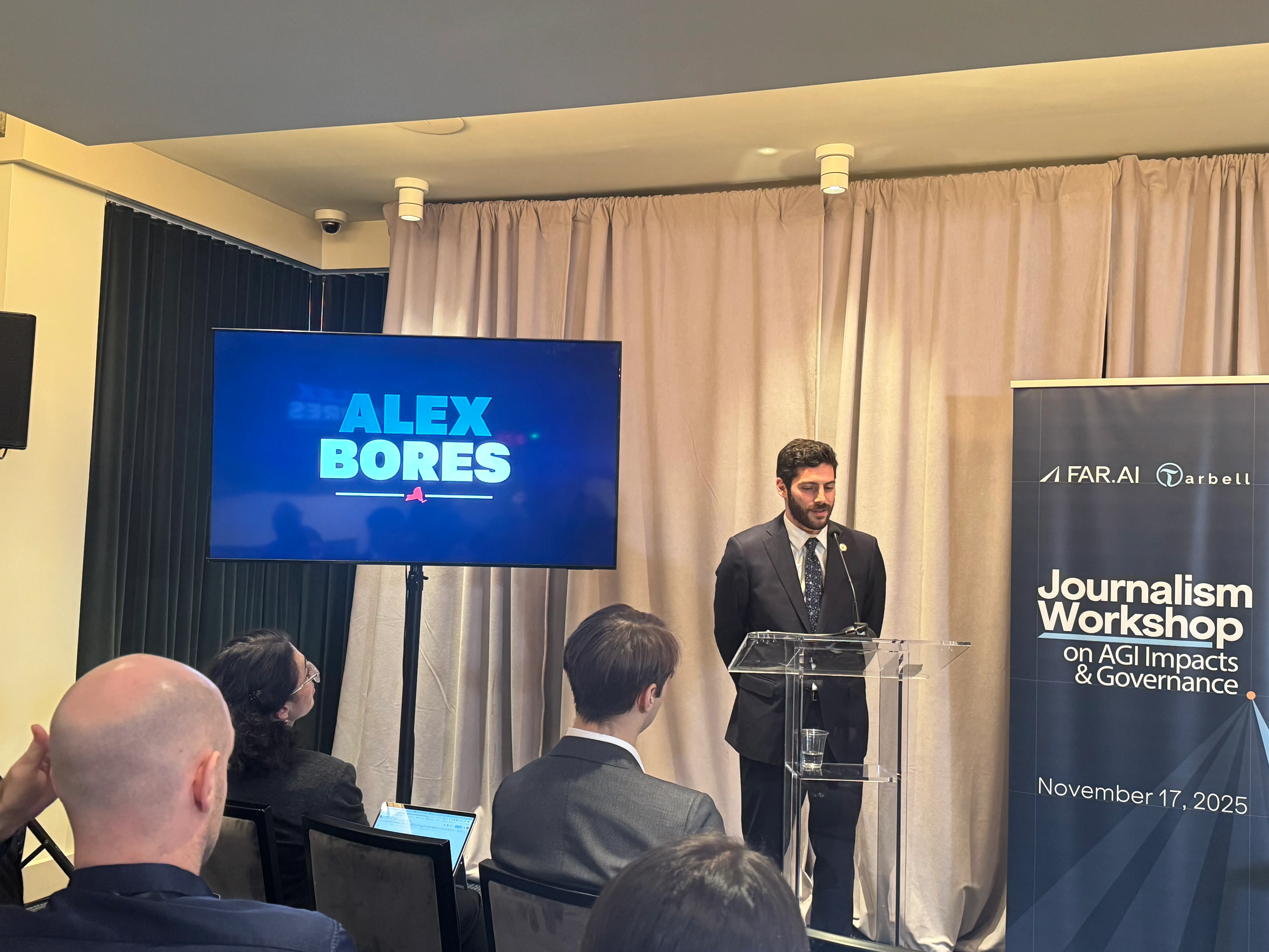 Alex Bores speaking at an event in Washington, D.C., on November 17, 2025.