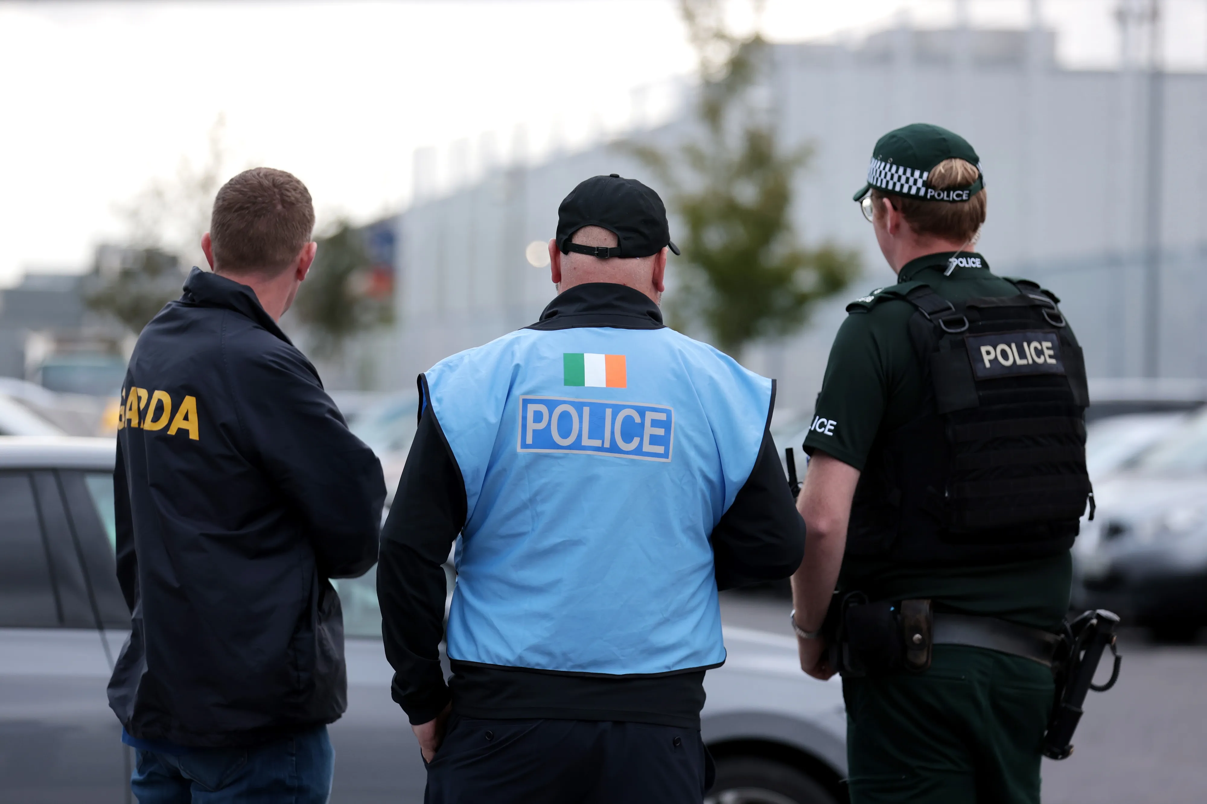 An Garda Siochana and Police Service of Northern Ireland officers outside the ground ahead of the UEFA Conference League play-off match at Clearer Twist National Stadium at Windsor Park, Belfast.